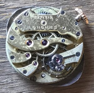 Женские золотые часы LONGINES с бриллиантами и сапфирами.