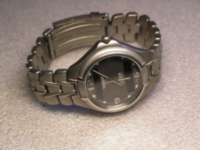 Продаю мужские часы TISSOT T65 NEW TITANIUM T65.7.488.61